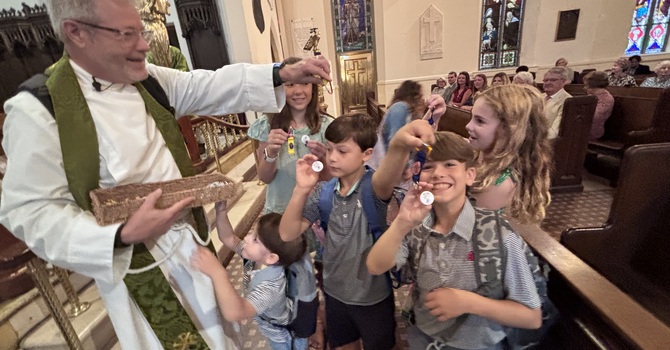 Students Receive Backpack Blessing image