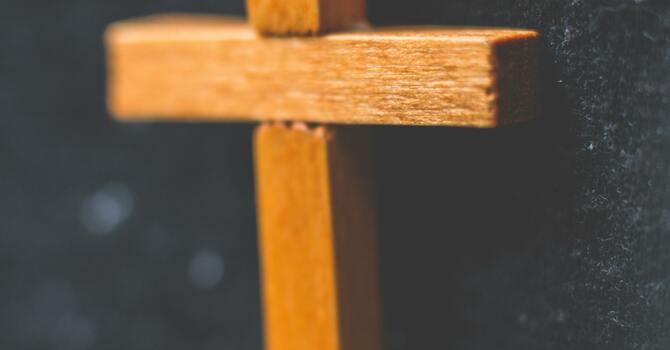 For whom is the cross lifted up? image