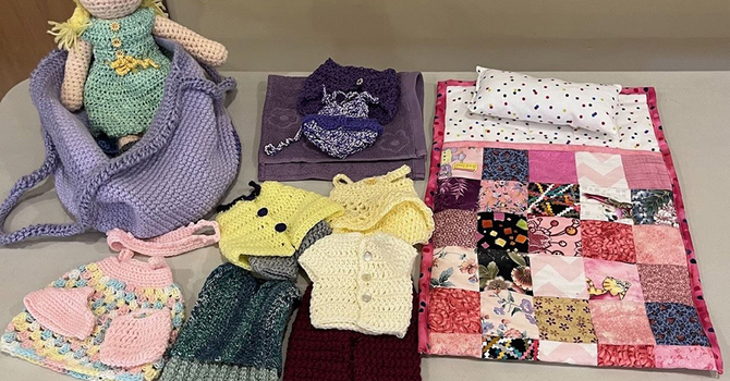 Crocheted Doll with Wardrobe