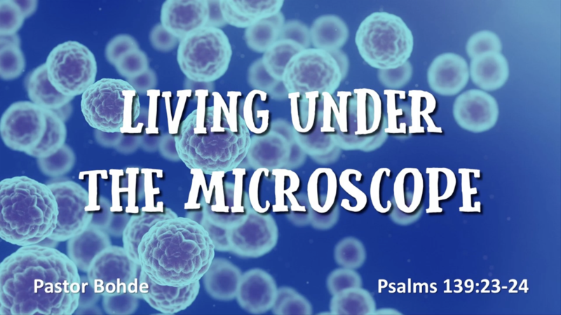 "Living Under The Microscope"