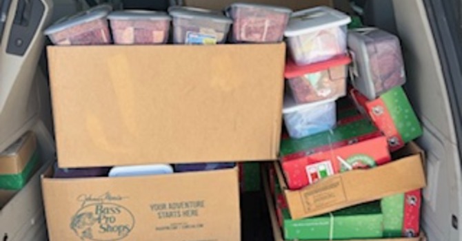 Dedication and packing of shoeboxes for Samaritan's Purse Operation Christmas Child image