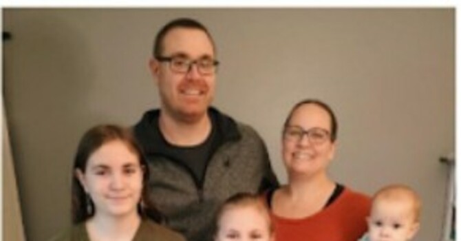 The Father Leans Into Us