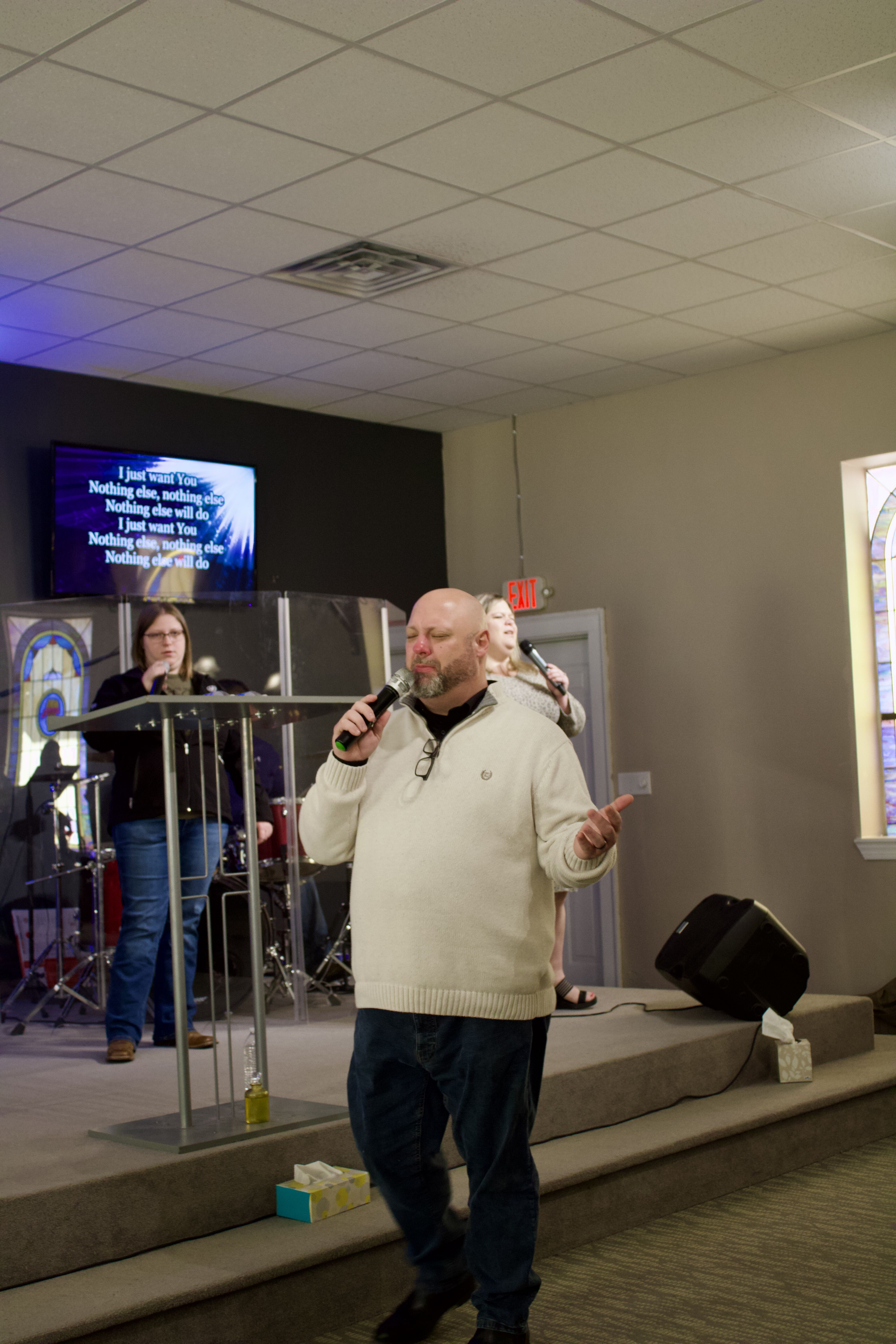 Pastor Philip Burns preaching at Relentless Worship Center