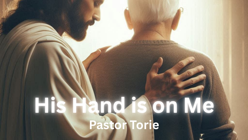 His Hand is on me
