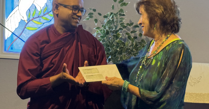 Monk San and Rev. Donna Loflin and the Walk for Peace Donation
