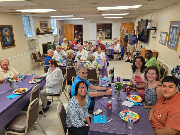 Flipping Burgers & Fellowship at the Summer Picnic