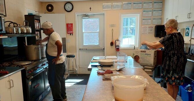 A Friday Farmworkers' dinner in a cool Hall