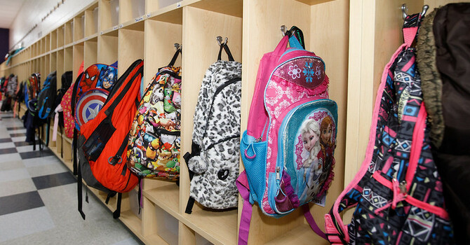Backpacks, lunch boxes, water bottles, Chlorox wipes. . . . image